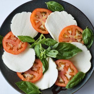 Dairy-free caprese salad w/ basil, tomatoes, and alternative mozzarella (paleo, AIP) from Flash Fiction Kitchen