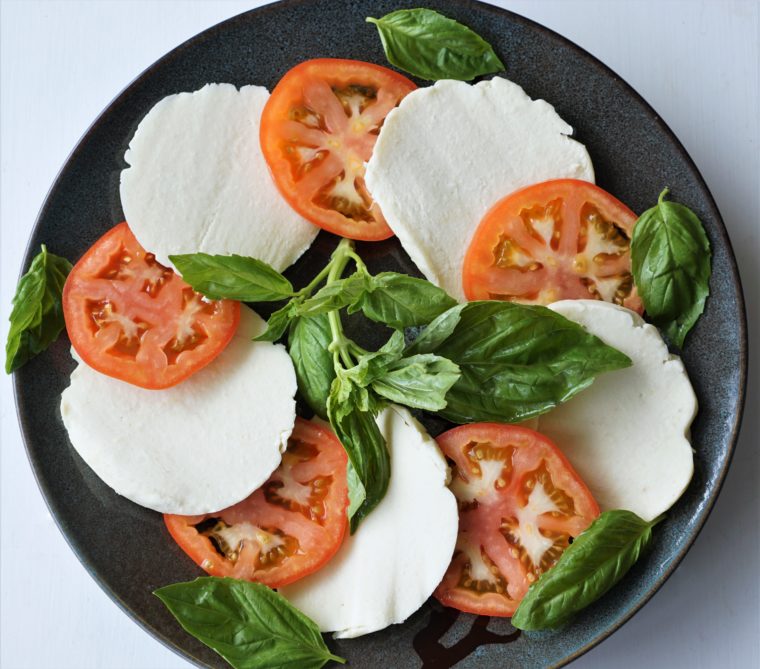 Dairy-free caprese salad w/ basil, tomatoes, and alternative mozzarella (paleo, AIP) from Flash Fiction Kitchen